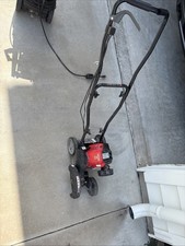 This is a Craftsman E210 gas-powered walk-behind lawn edger