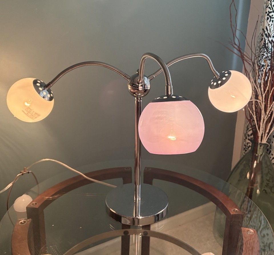 Chrome atomic satellite lamp with 3-way lighting — the Sputnik-era fantasy for your nightstand or bar cart.