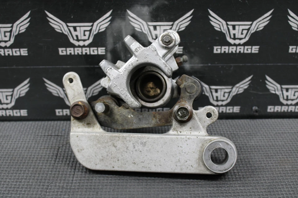 Suzuki 02-15 RM85 RM85L 2005 OEM TOKICO PINZA DE FRENO TRASERA 69100-03B00-999 Foto 2 de 4