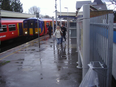 Photo 6x4 Train arrival in storm at Strawberry Hill station Twickenham  c2008