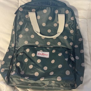 button spot multi pocket backpack