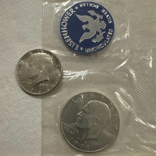 1964 Silver kennedy half dollar and Uncirculated 40% Silver Eisenhower Dollar