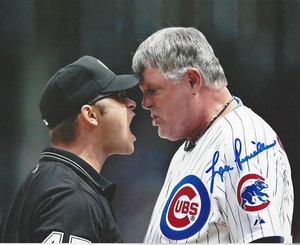 Chicago Cubs Mgr. Lou Piniella autographed photo  8x10 face to face with Umpire*