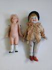 2 Antique All Bisque dolls Both are marked Boy Germany Girl J 947 5" & 3-1/2"