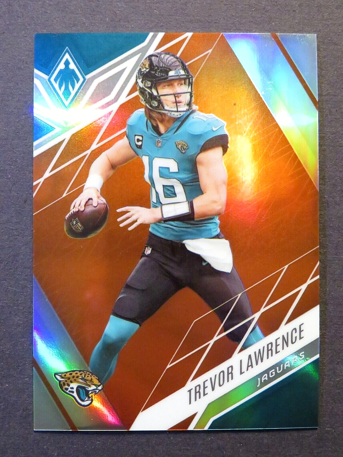 2022 Panini Phoenix Football Trevor Lawrence Orange Card #33 Jaguars 9/99 SP!