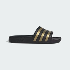 Image of Adilette Aqua Slides in Black/Gold Metallic
