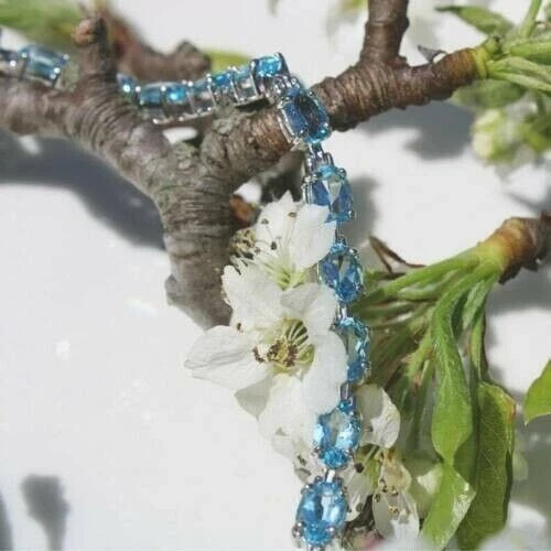 Brazalete de tenis simulado topacio azul Londres de 7,50 quilates para mujer enchapado en oro blanco de 14 k Foto 2 de 4