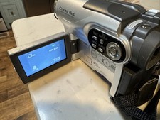 Hitachi DZ-BX35A DVD Camcorder with 25x Optical Zoom, Bundle- Includes 9 Discs