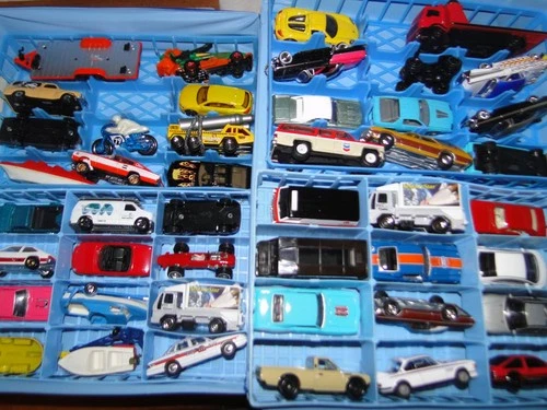 Large vintage and recent diecast trucks cars in vintage case