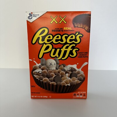 KAWS X REESE'S PUFFS CEREAL 11.5 OZ BOX COLLECTORS EDITION (UNOPENED)