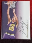 1996-97 Skybox Premium Autographics Black Ink Greg Ostertag basketball card