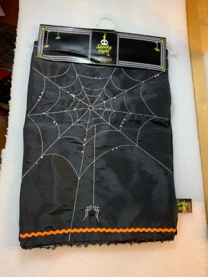 BLACK 13 X 72 INCH SPIDER WEB TABLE RUNNER HAS LITTLE CRYSTALS ON IT