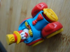 jouet mac do vintage " RONALD MAC DONALD "  EN VOITURE