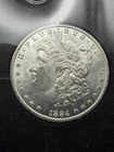 1884 CC Morgan Dollar - BU GSA - No COA/Damaged Box