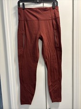 ATHLETA RAINIER HIGH RISE REFLECTIVE LEGGINGS IN A REDDISH BURGUNDY SZ M LKNEW