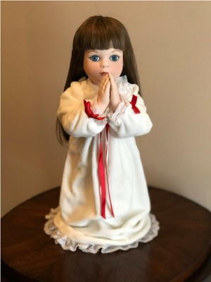 a christmas prayer porcelain doll