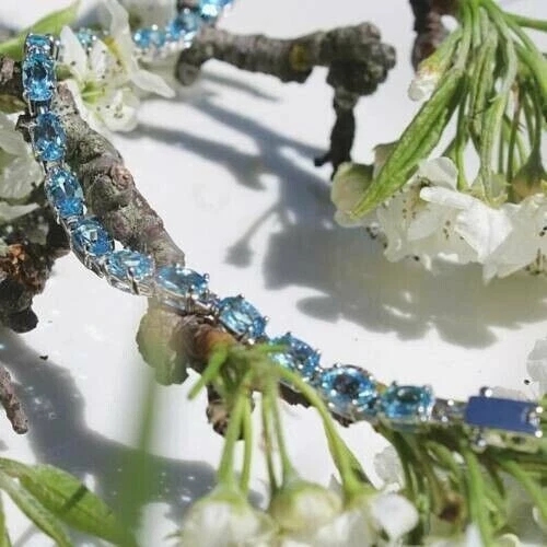 Brazalete de tenis simulado topacio azul Londres de 7,50 quilates para mujer enchapado en oro blanco de 14 k Foto 3 de 4