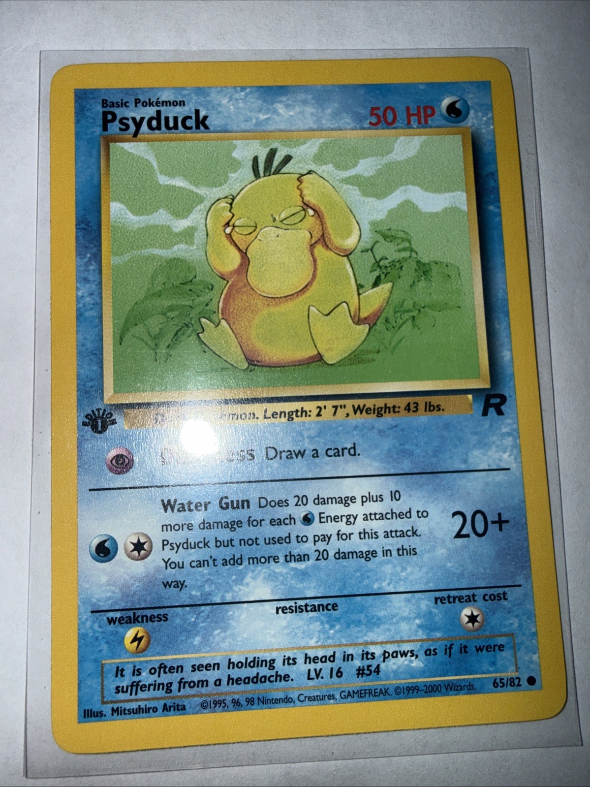 Psyduck 65/82 1st Edition Team Rocket Pokémon Card Near Mint WOTC Vintage TCG