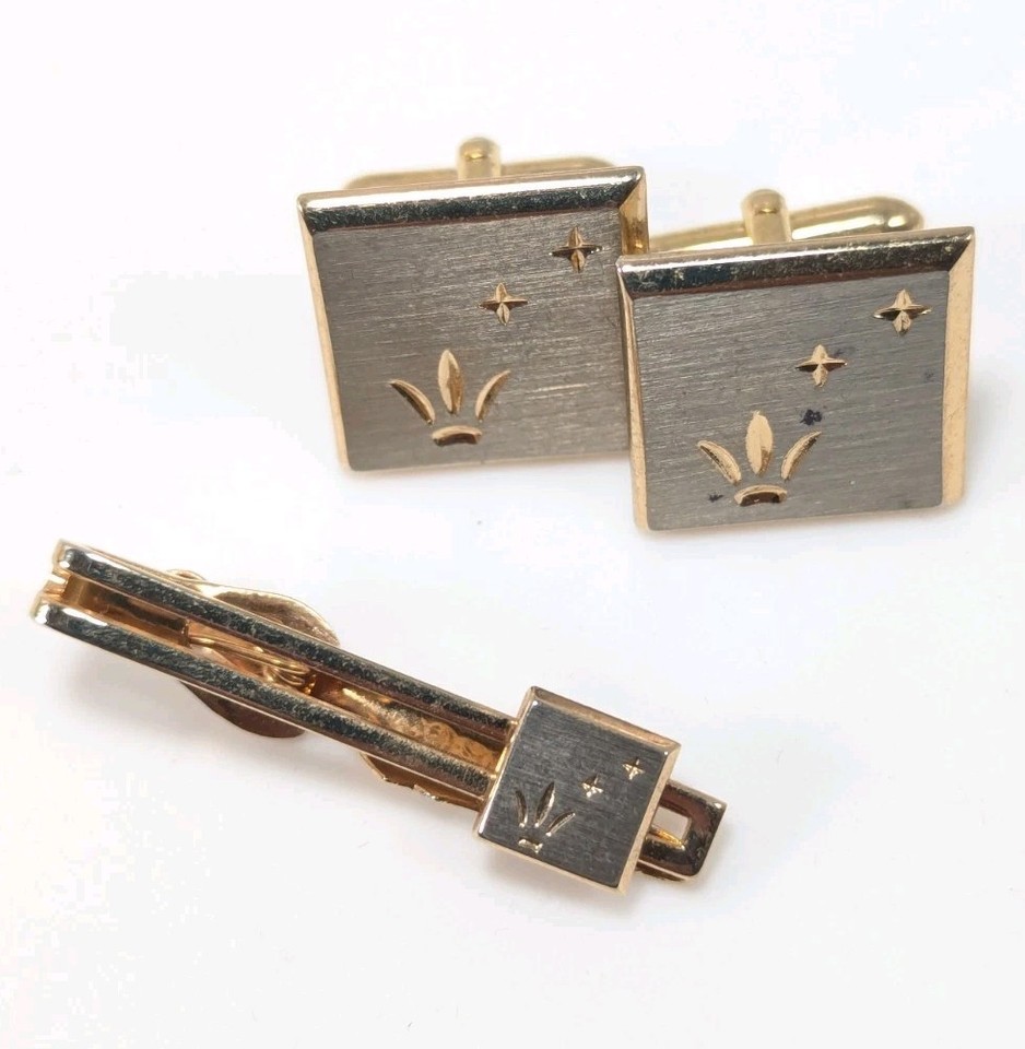 A complete vintage gold-and-silver cufflink & tie clip set — the kind of dapper mid-century accessory that's genuinely hard to find as a matched pair.