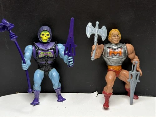 1984 Vintage MASTERS OF THE UNIVERSE Battle Armor He-Man And Skeletor w/ Weapons