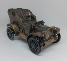 Vintage 1906 Oldsmobile Bronze Colored Metal Car Coin Bank Banthrico 1974
