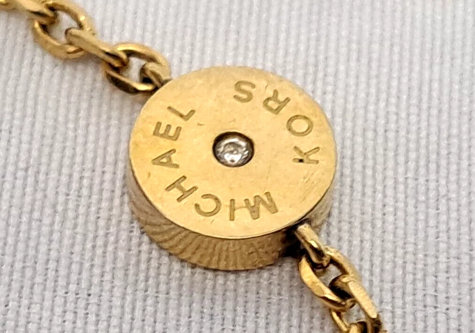 Pulsera Michael Kors Tono Dorado Amatista Circonita Cúbica Eslabón Estación 2.5" Belleza Foto 3 de 4