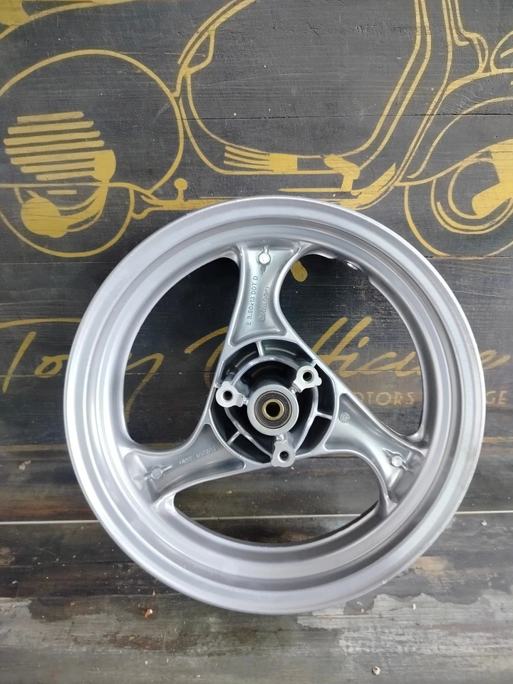 TO-R3708 - CERCHIO RUOTA ANTERIORE ARGENTO APRILIA SR 50 1994-1996 - 8208376 - Immagine 4 di 4