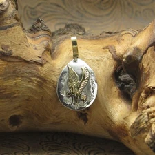 Sterling Silver And Brass Hovering Eagle Pendant