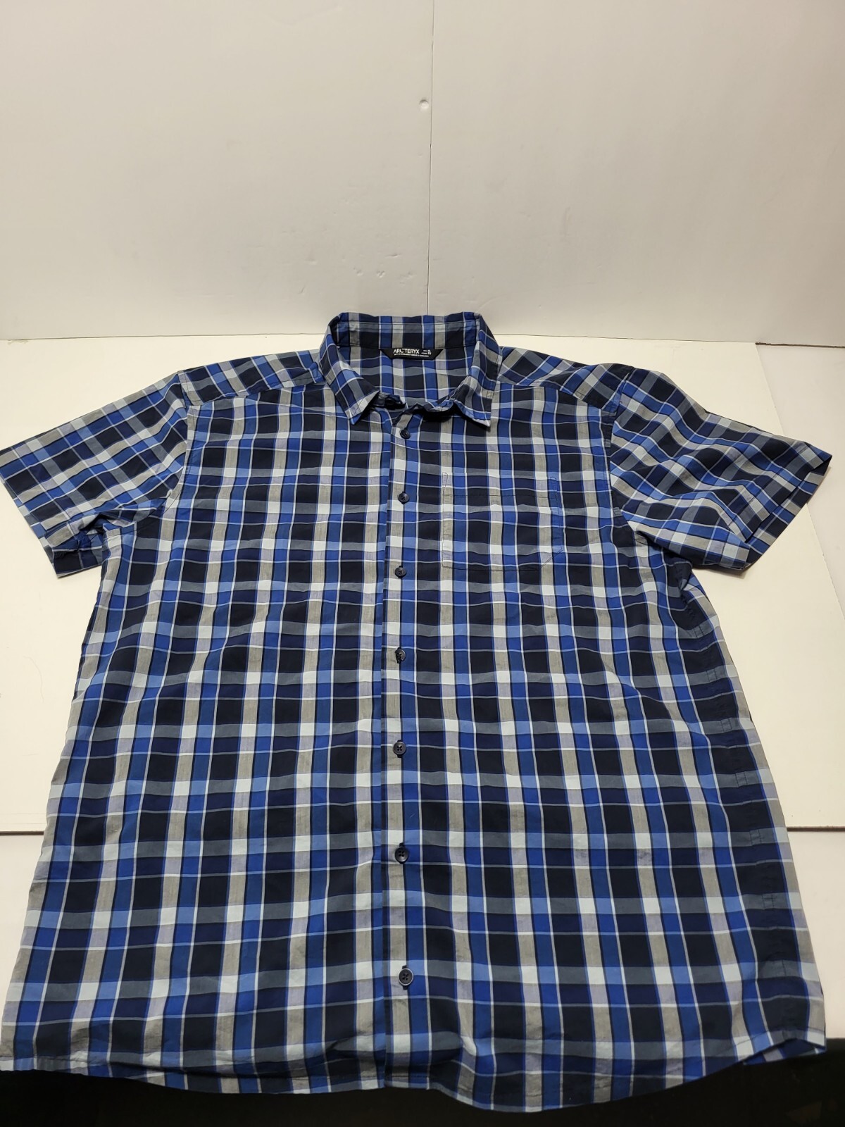 Camicia da uomo blu tasca Arc'teryx maniche corte a quadri taglia XL ottime condizioni Wow bella