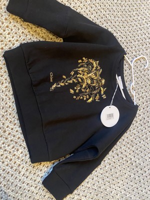 Chloe Pullover schwarz und gold. Neu. Alter 3. UVP 135£.