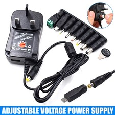 Universal 3-12V Adjustable Voltage Adaptor Charger USB AC/DC Power Supply Adapte