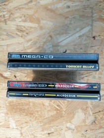 Sega MegaCD Microcosm und Tomcat Alley mit OVP Anleitung CIB