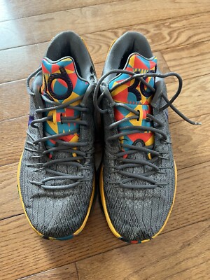 black and teal jordan 12s