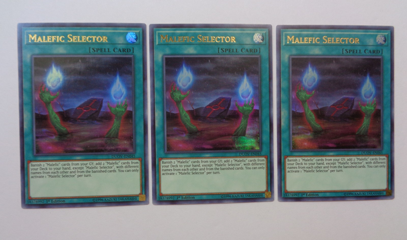 Playset: 3x Malefic Selector DUOV-EN045 (Ultra Rare, 1st Edition, Near Mint)
