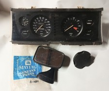 Genuine TRIUMPH TR7 DASHBOARD CLOCKS & fuel cap & door mirror.
