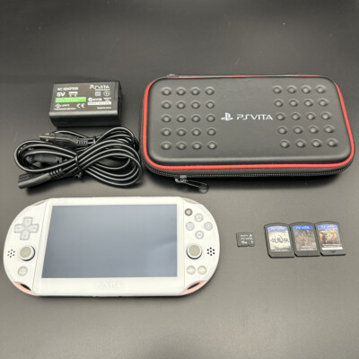 PS Vita PCH-2000 Sony Playstation Console only Choice 3 random games case Used