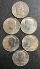 1964 Kennedy Half Dollar (Lot of 5) and 1957 Kennedy Half Dollar (1)