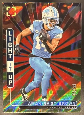 Amon-Ra St. Brown 2025 PhotoGenic #18 Light It Up Red 84/99 Lions