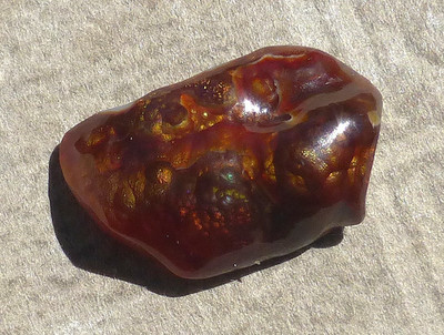 Natural hand fashioned colorful Fire Agate cabochon Graham CO. AZ. 22.20 carats