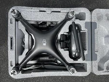 DJI Phantom 4 Drone Model WM330A, 1 battery, 3 spare props & case