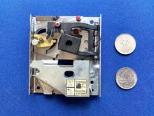 monnayeur flipper à 5 francs ***