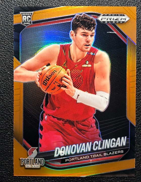 Donovan Clingan 2024-25 Panini Prizm Black Orange Prizm 37/49 RC #131