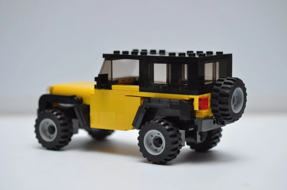 Camión Jeep Rubicon personalizado modelo amarillo construido compatible con ladrillos LEGO® reales Foto 2 de 3