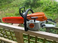 STIHL MS 261C Professional Grade Chainsaw, 14" bar and 9 saw chains, hardly used