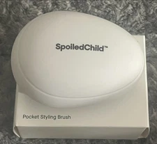 New in box , spoiled child, pocket brush 