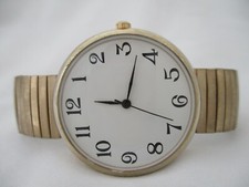 Unisex Gold Toned Stretch Band Analog Watch
