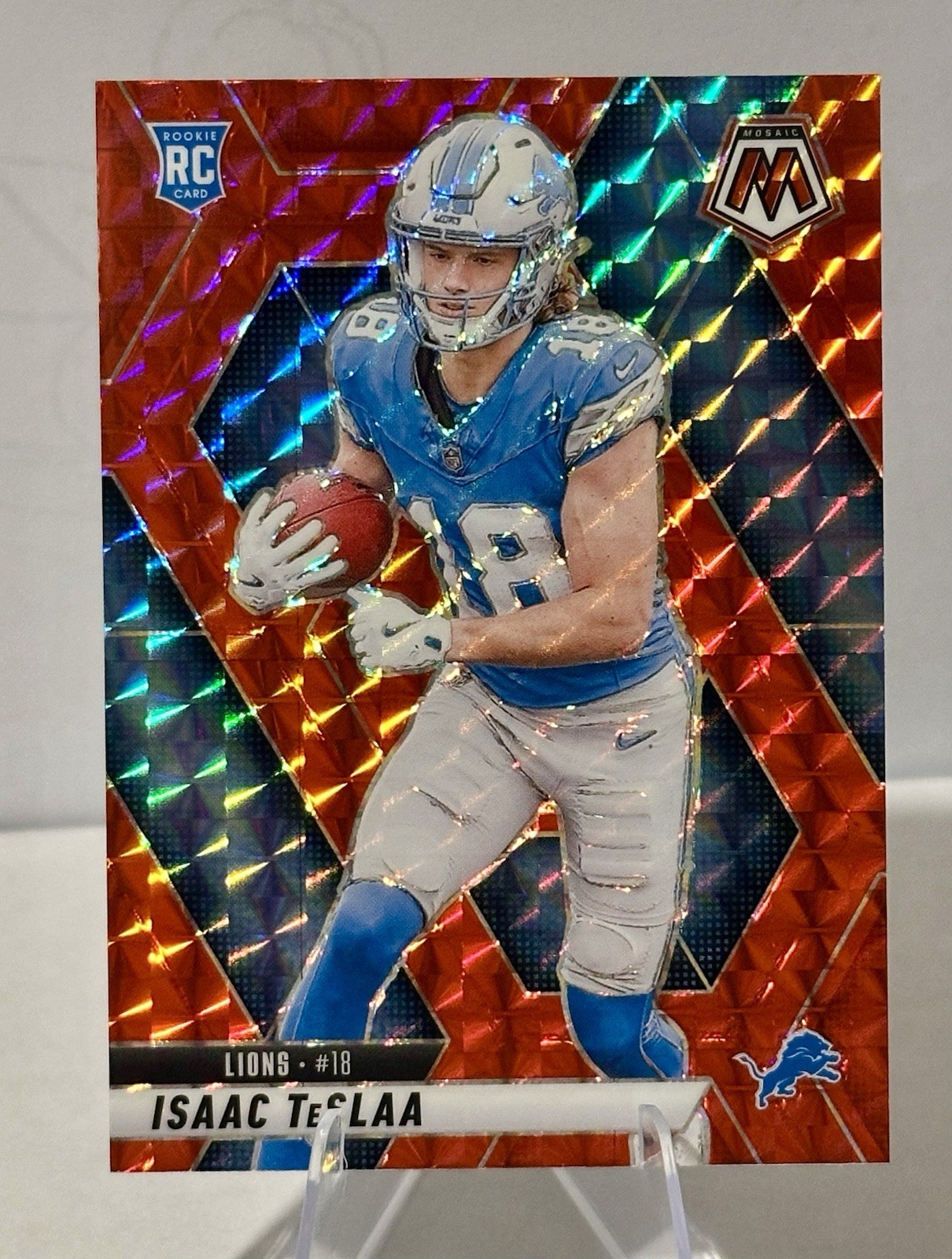 2025 Panini Mosaic #319 Isaac TeSlaa Red Prizm Mosaic RC Detroit Lions