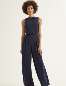 black jumpsuit with overlay