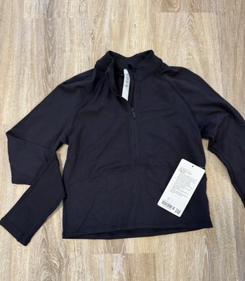 Lululemon It s Rulu Long Sleeve Half Zip. Size 4. Color Black. NWT