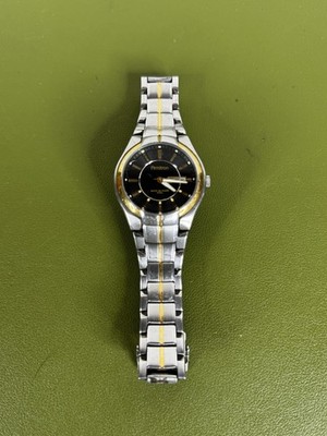Armitron Men's Watch 40mm Silver Gold Two Tone Day Date WR 50M, 1M02